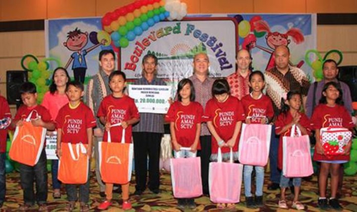 GKIC Provides Assistance for Traumatic Children of Manado Post Floods Disaster